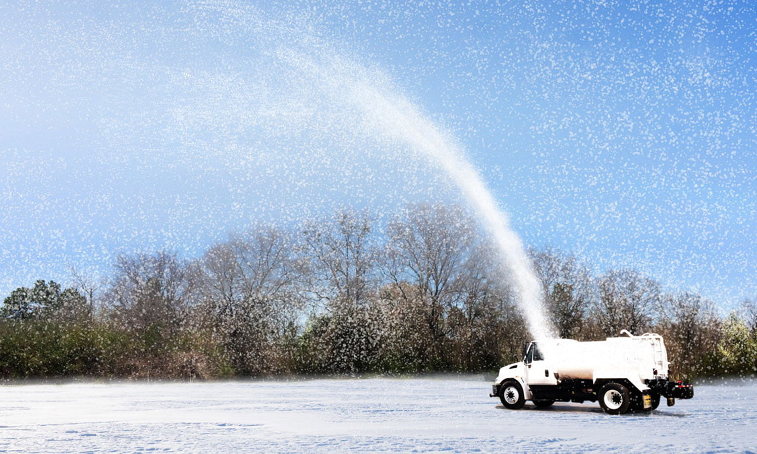 Ledwell Water Truck spraying snow